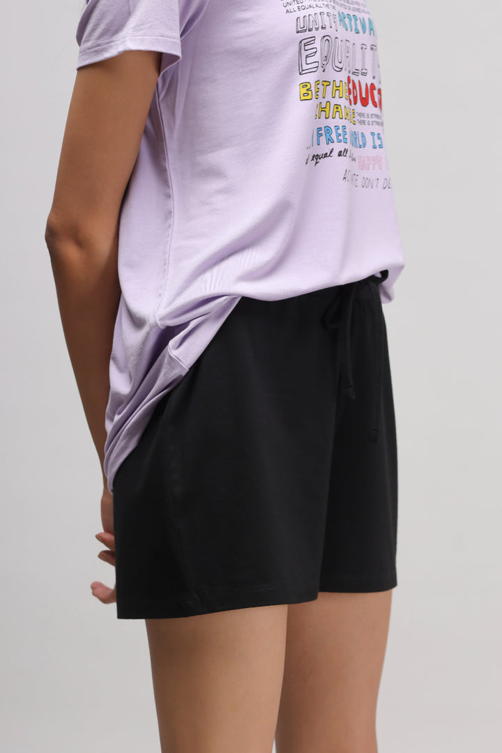 Equality Shorts Set featuring a casual purple tee and black shorts.