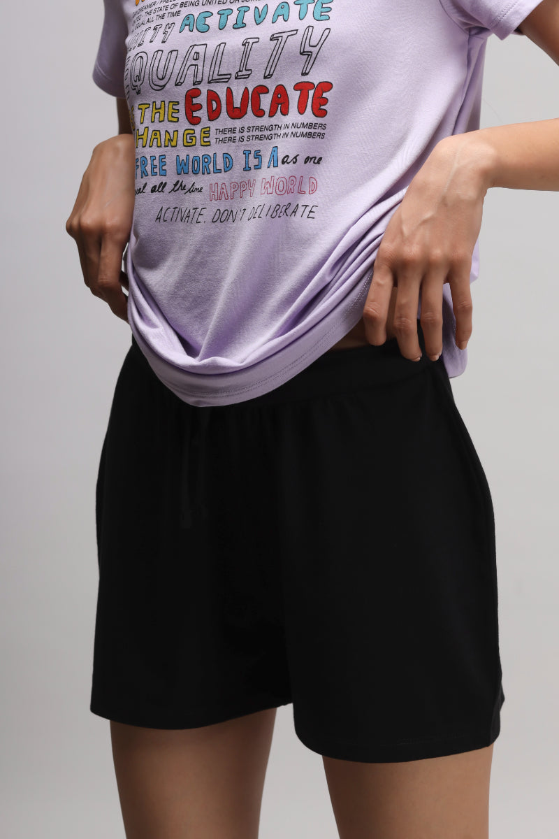 Equality Shorts Set featuring a purple top and black shorts.