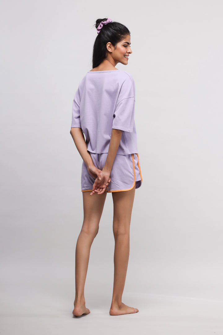 Boxy purple cotton shorts set, stylish and comfortable for casual wear.