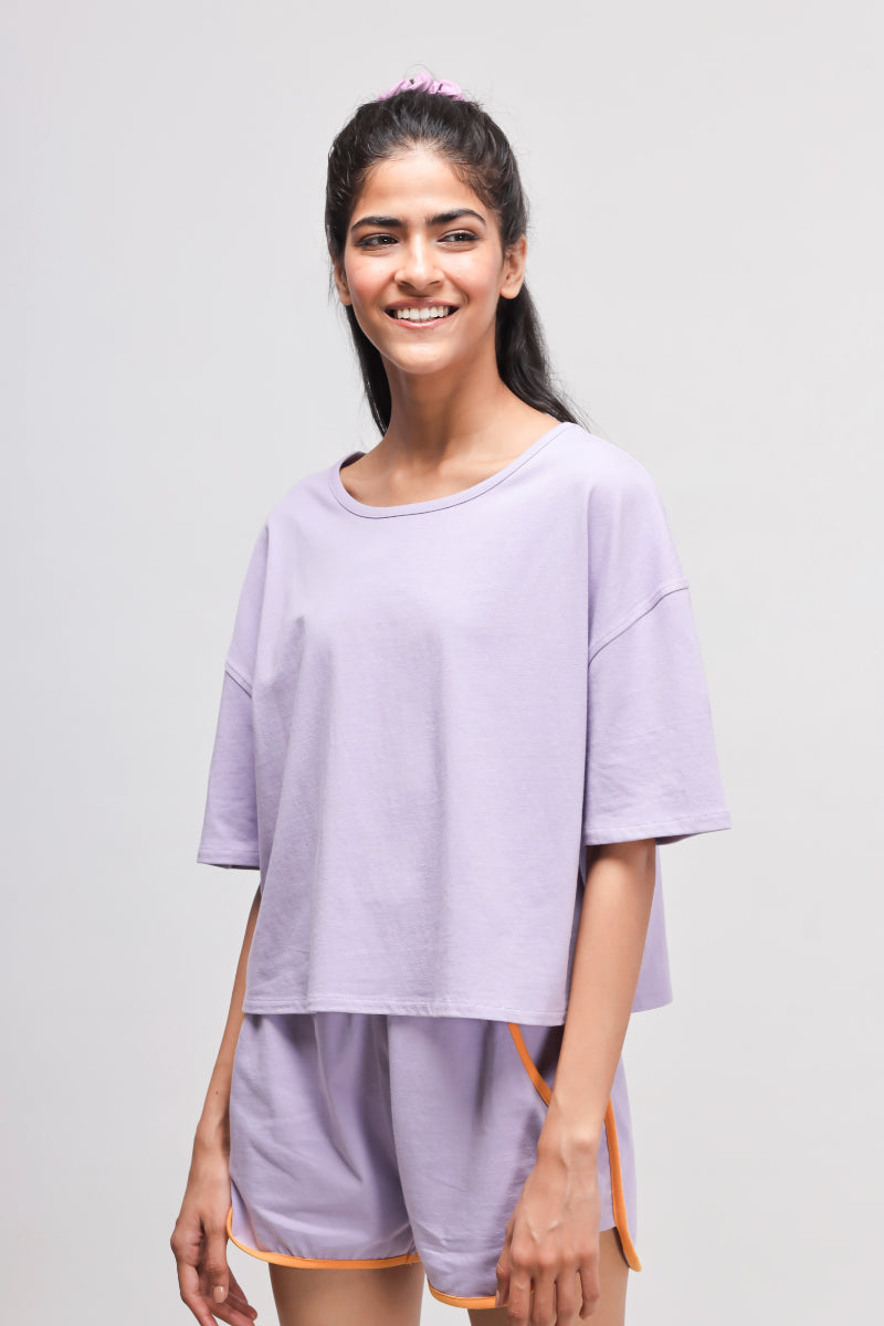 Boxy purple cotton top for casual and comfortable styling.