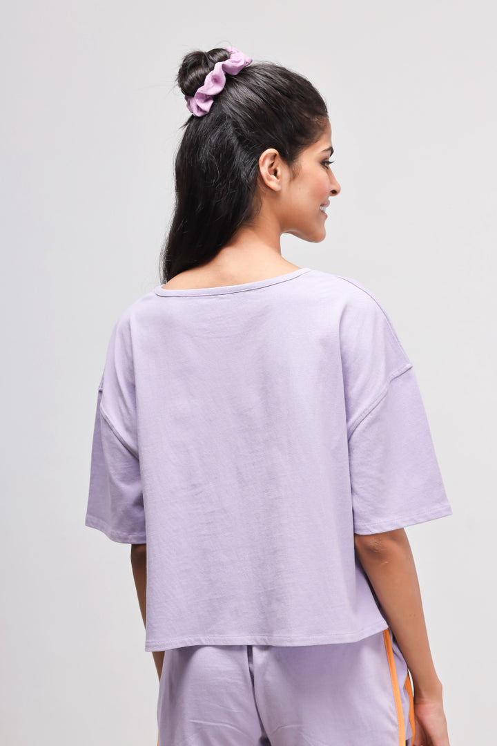 Boxy purple cotton shorts set showcasing relaxed fit and stylish design.