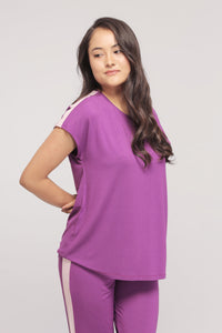 Royal purple top with pink stripe, stylish and comfortable women's wear.