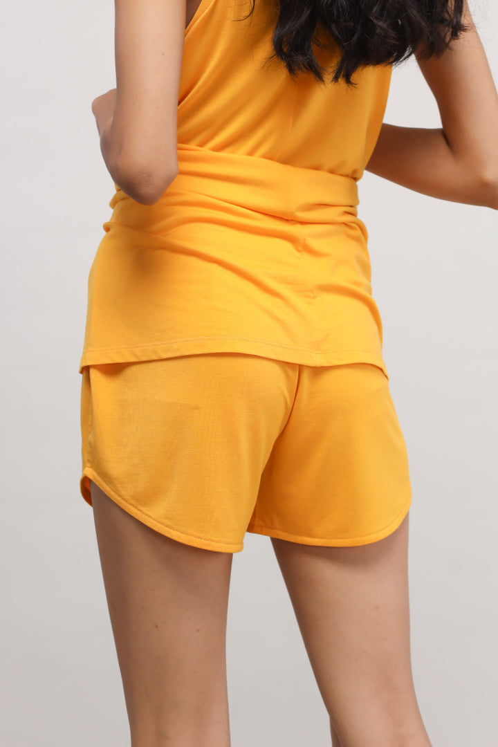 Butterfly Mango Shorts in vibrant yellow, perfect for summer wear.