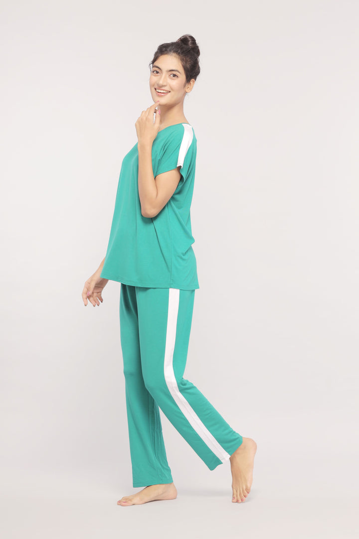 Cozy green pajamas set with white stripes for comfort and style.