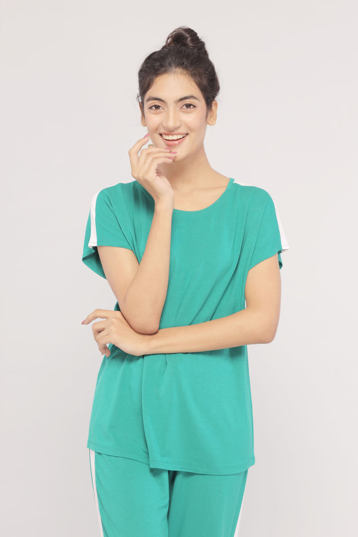 Cozy green lounge top with white stripes for relaxed comfort.