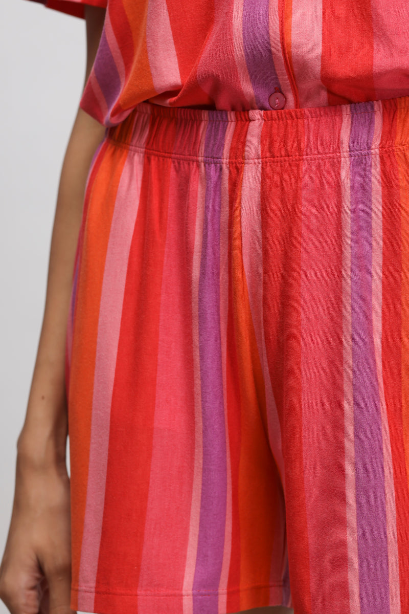 Red striped shorts featuring vibrant colors for a stylish summer look.