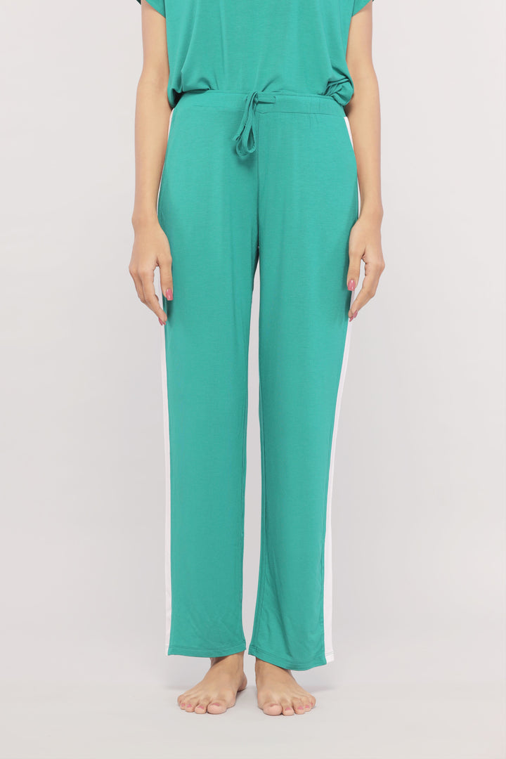 Cozy green loungewear set with white stripes for comfortable style.
