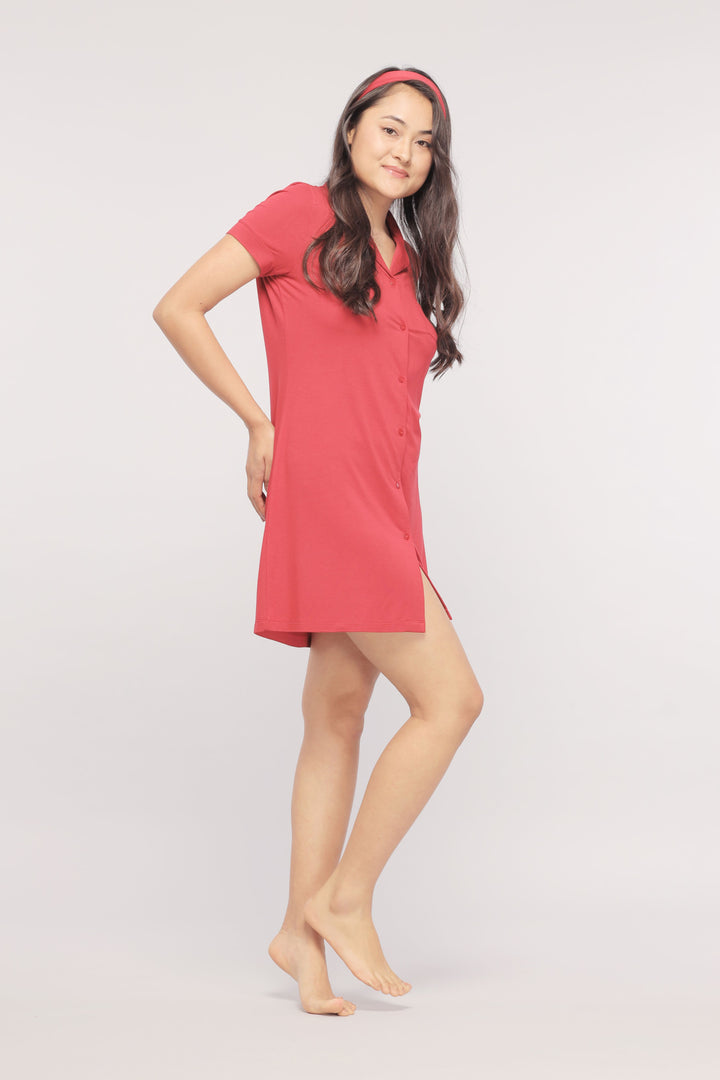 Romantic red lace button down dress modeled by woman.