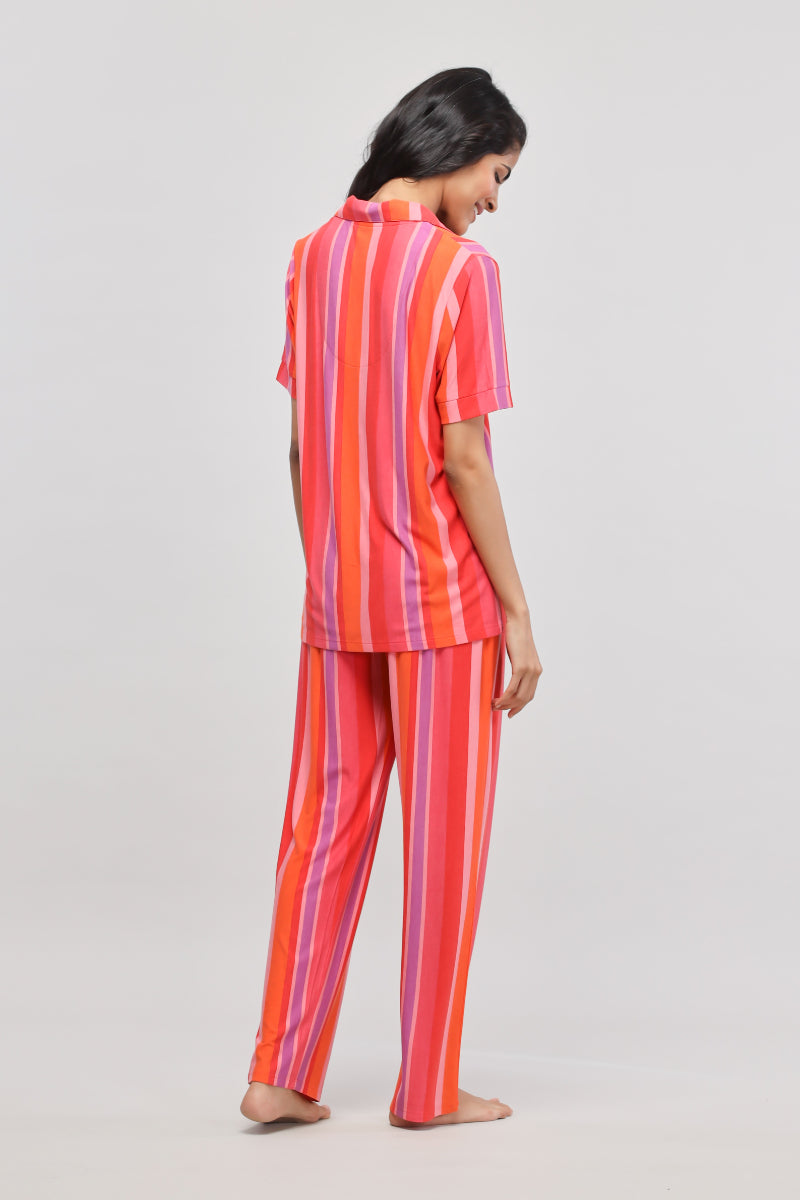 Red striped top and pants set for stylish and comfy wear.