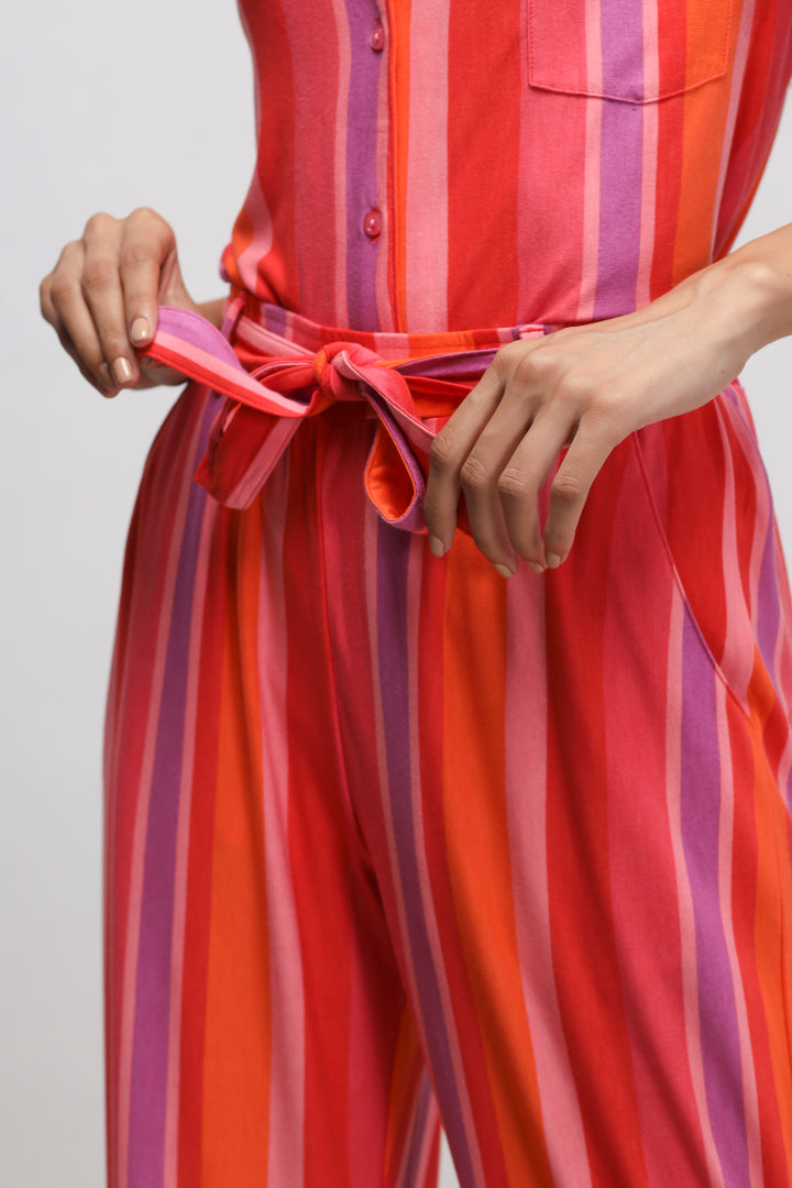 Colorful red stripe pajama set featuring a tied waist and buttons.