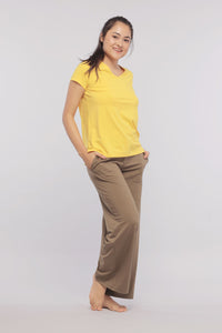 Sunny Lime Supima® V Neck Tee worn by model in casual outfit.