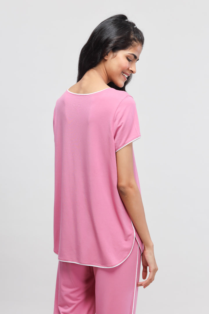 Rose pink top with white piping, stylish and comfortable.