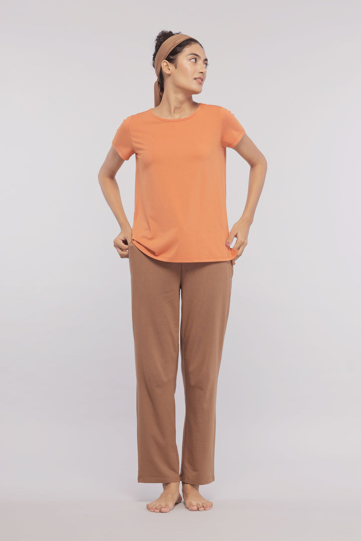 Golden Ochre Supima Round Neck Tee styled with brown pants.