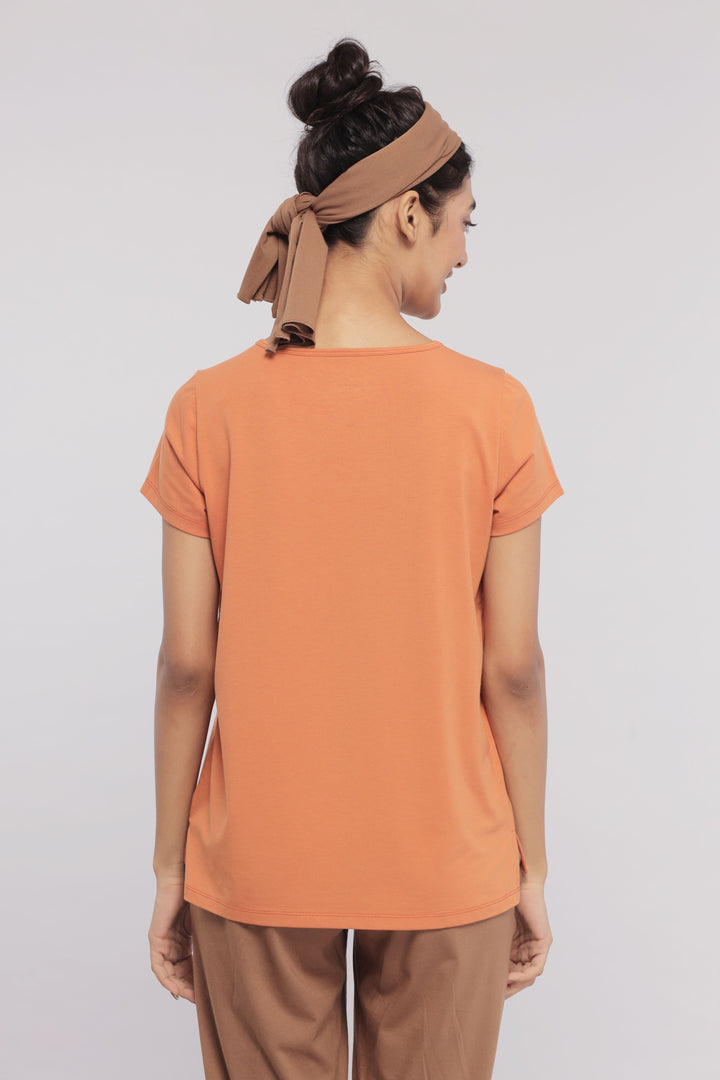 Back view of woman wearing Home Brown Flared Supima® Lounge Set.