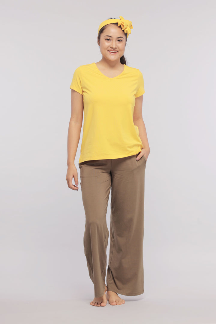 Model wearing Military Olive Flared Supima® Lounge Pant with yellow top.