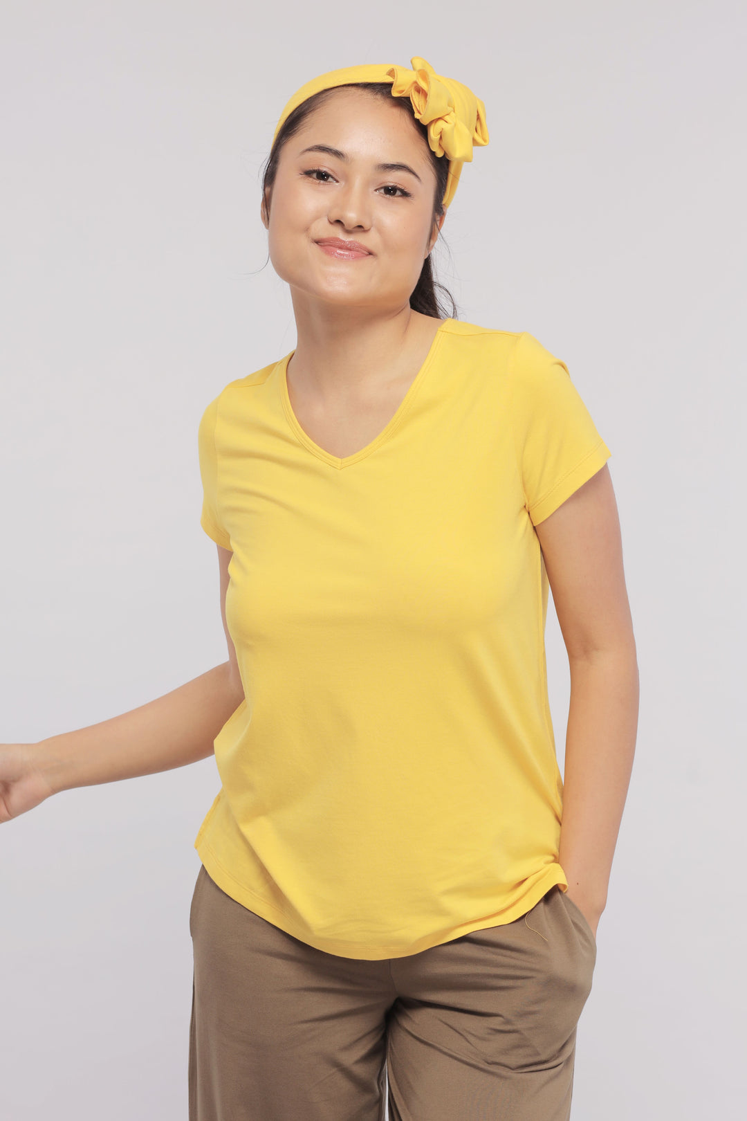 Sunny Lime Flared Supima® Lounge Set model smiling in yellow top.