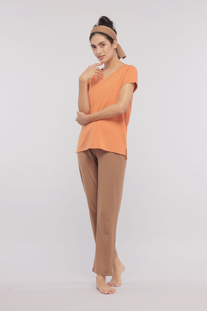 Home Brown Straight Supima® Lounge Set on a model in casual pose.