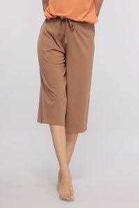 Home brown Supima® culottes stylishly displayed on a model.