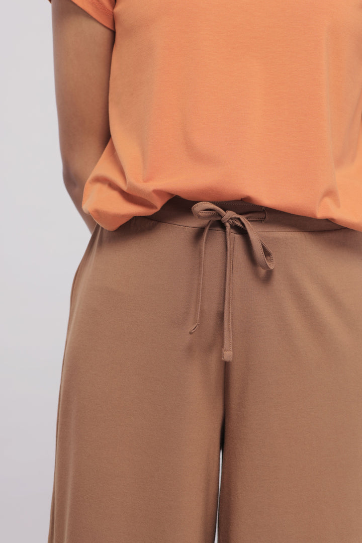 Home Brown Flared Supima® Lounge Set with comfortable top and pants.