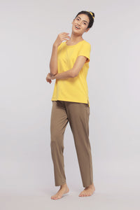 "Model wearing Military Olive Supima® Lounge Set in yellow and brown."