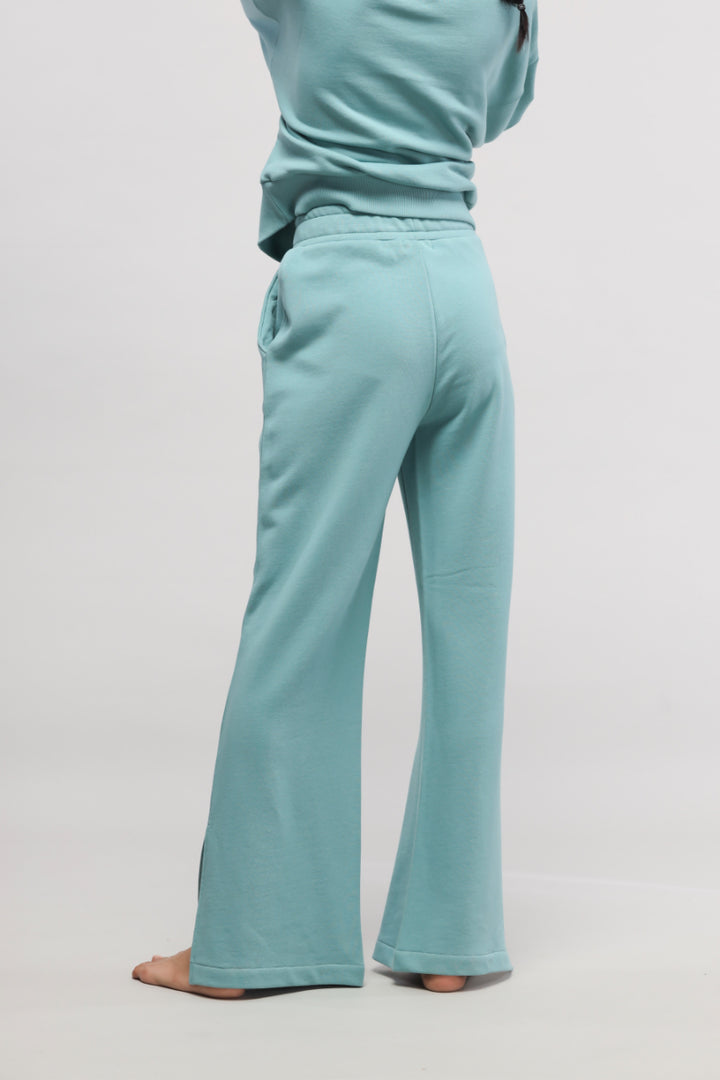 Woman wearing mint green Bonjour Terry Co-ord Set from behind.