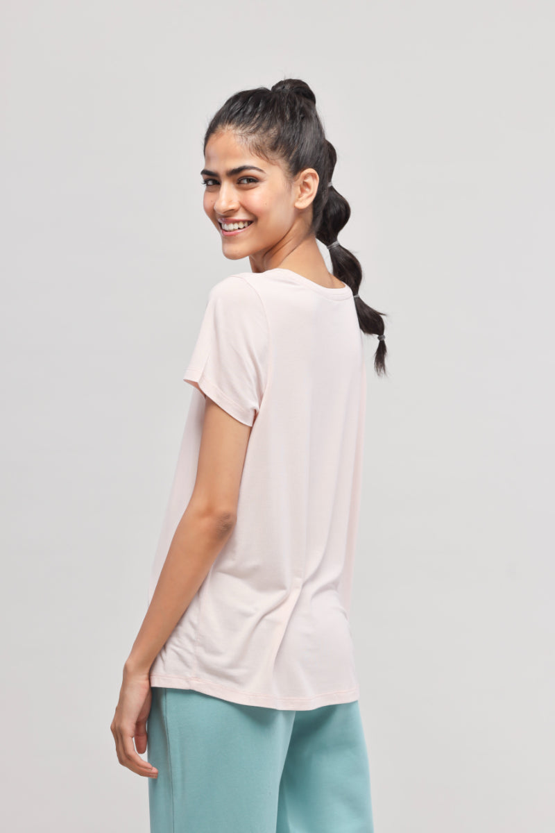 Light pink top from Aqua Terry Travel set, stylish and comfortable.