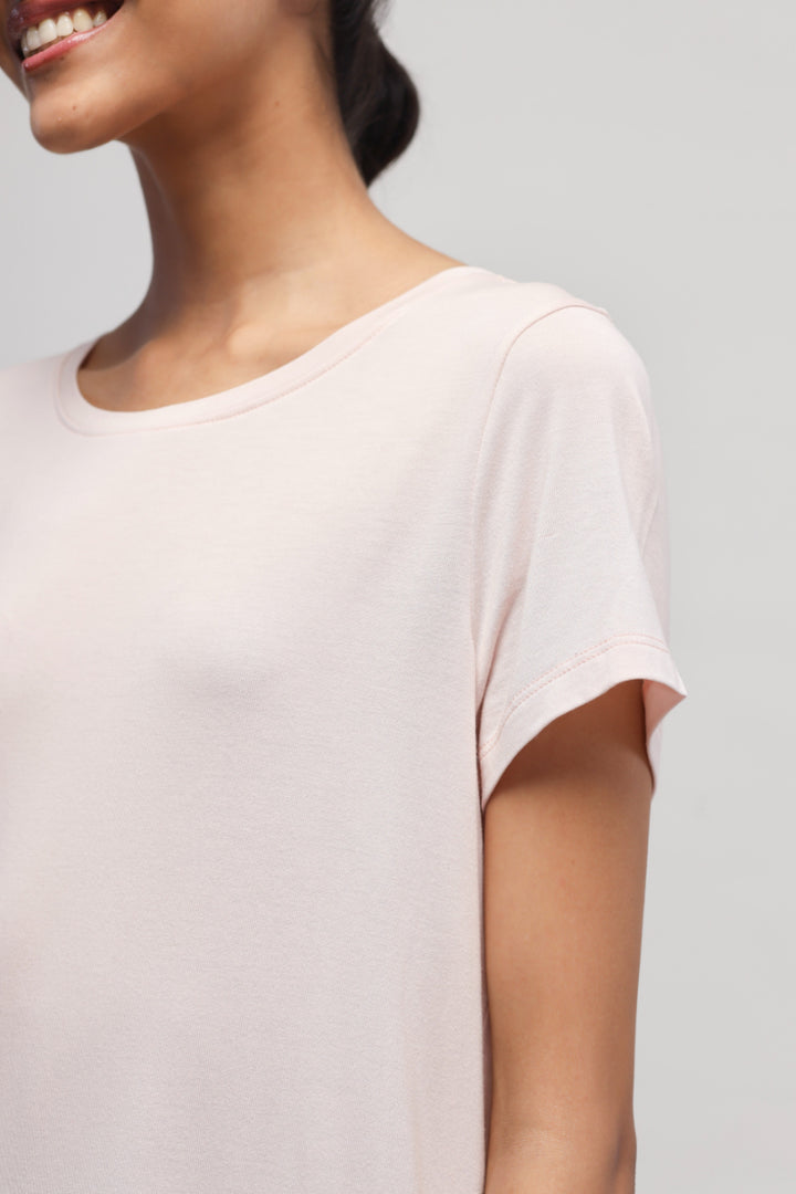 Light pink top from Aqua Terry Travel set for stylish comfort.