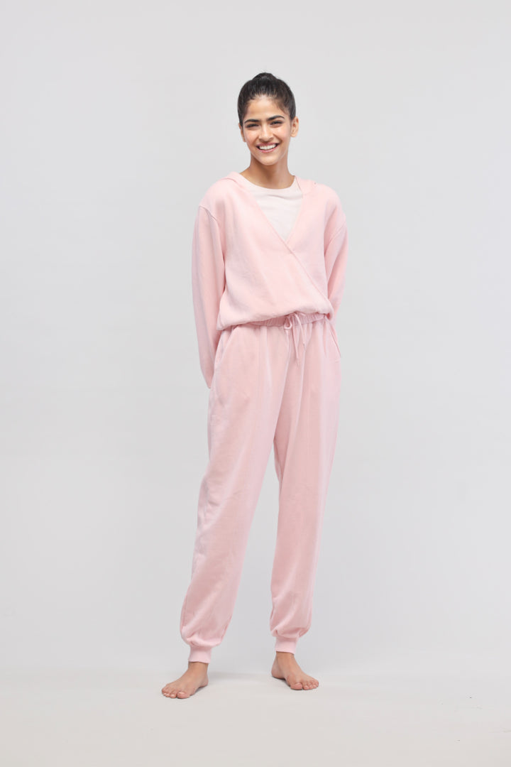 Pink Terry Travel Joggers on a model, perfect for casual comfort.