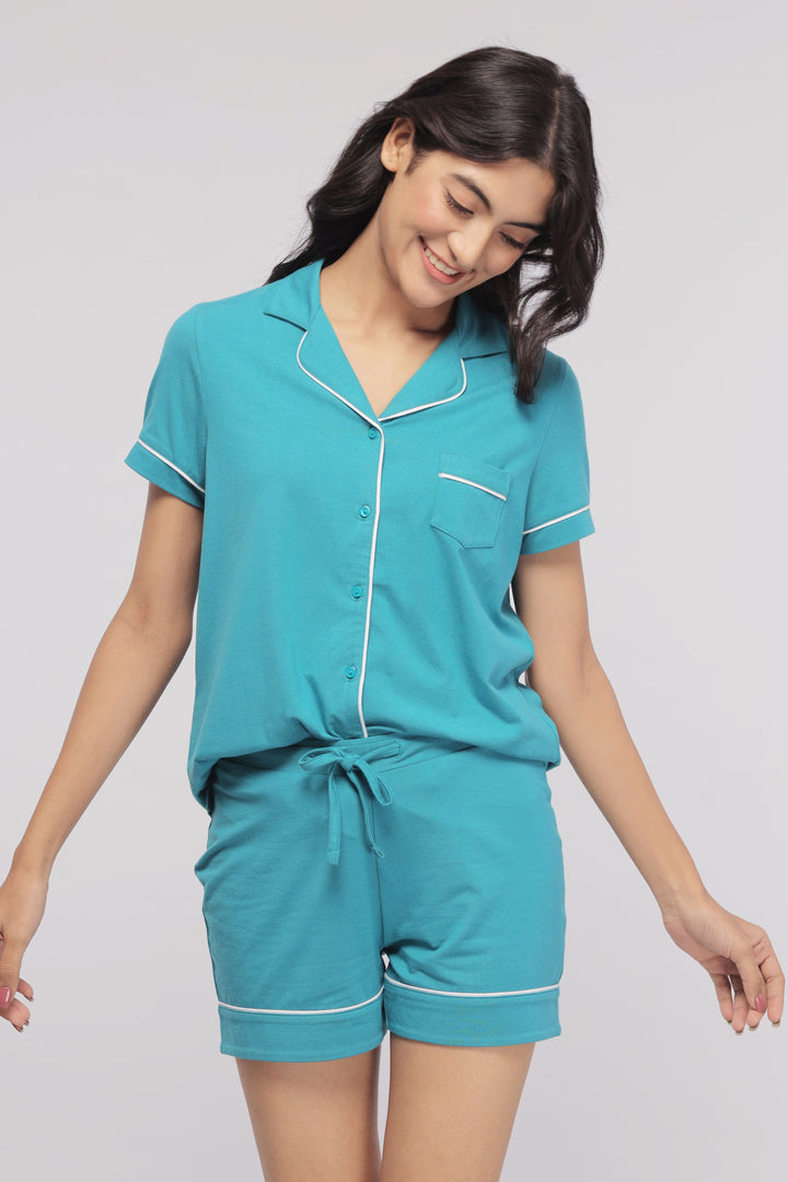 Teal shorts set with white piping for comfortable, stylish sleepwear.