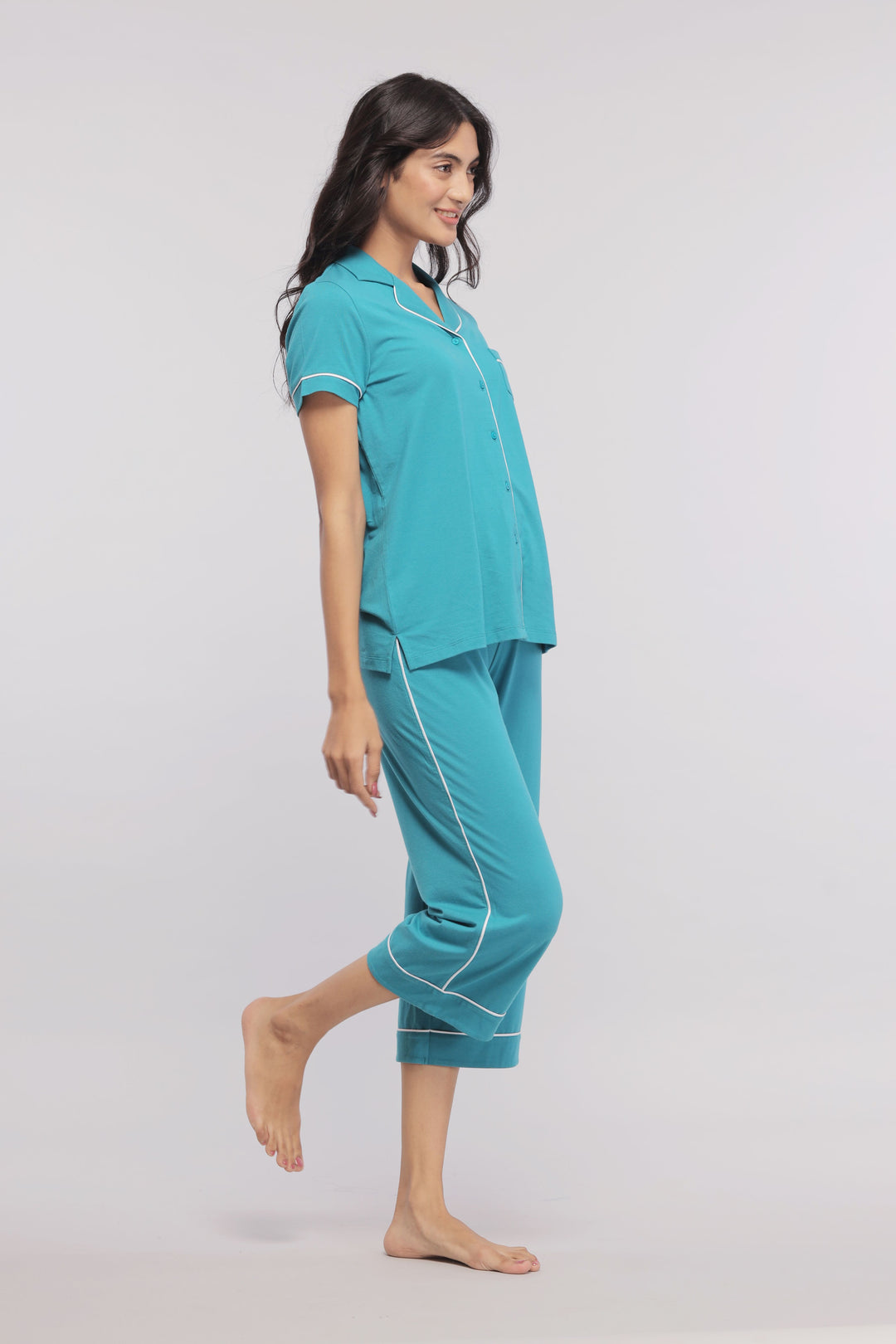 Teal Capris With White Piping