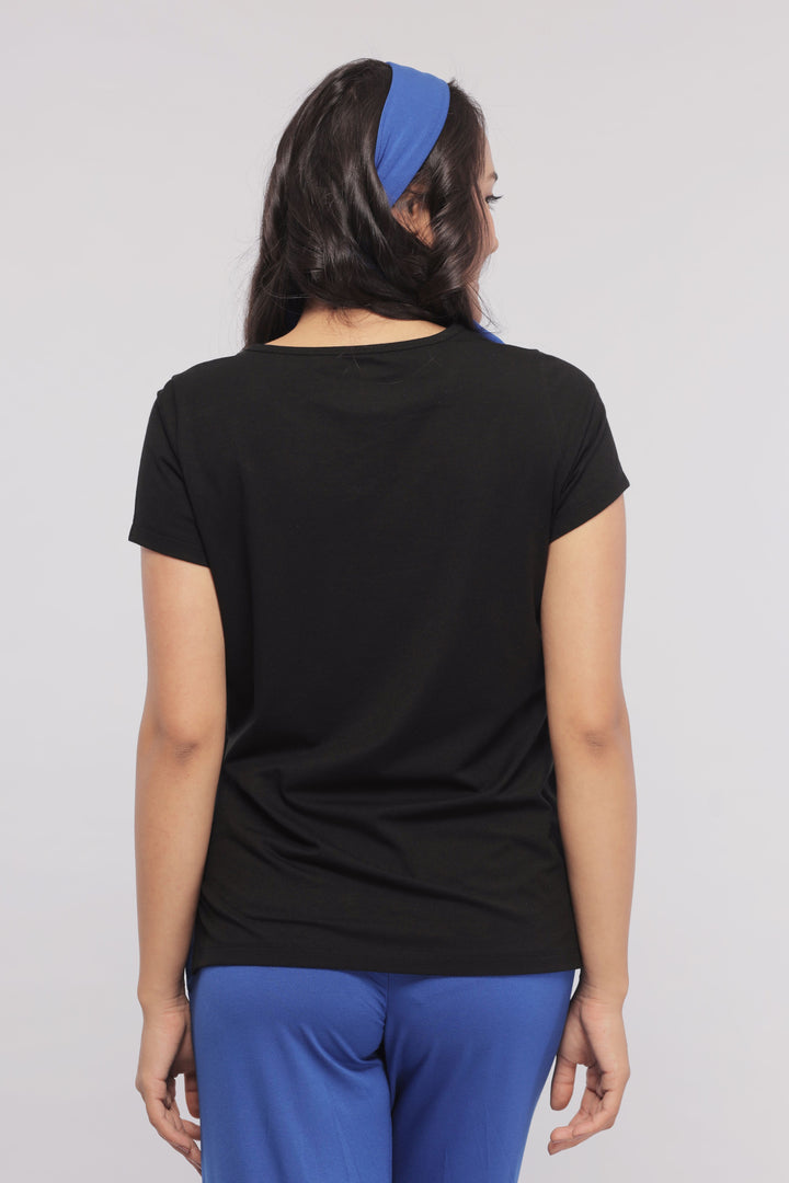 Back view of Black Supima® Women's Tee with stylish blue headband.