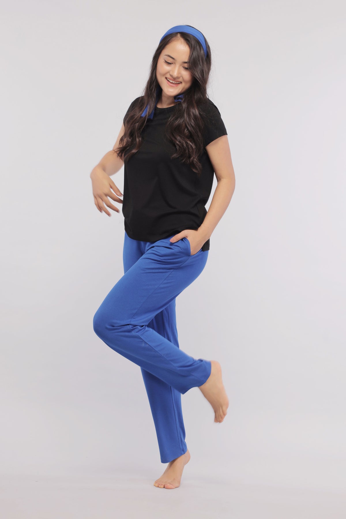 Model wearing True Blue Straight Lounge Pant, comfortable style and vibrant color.