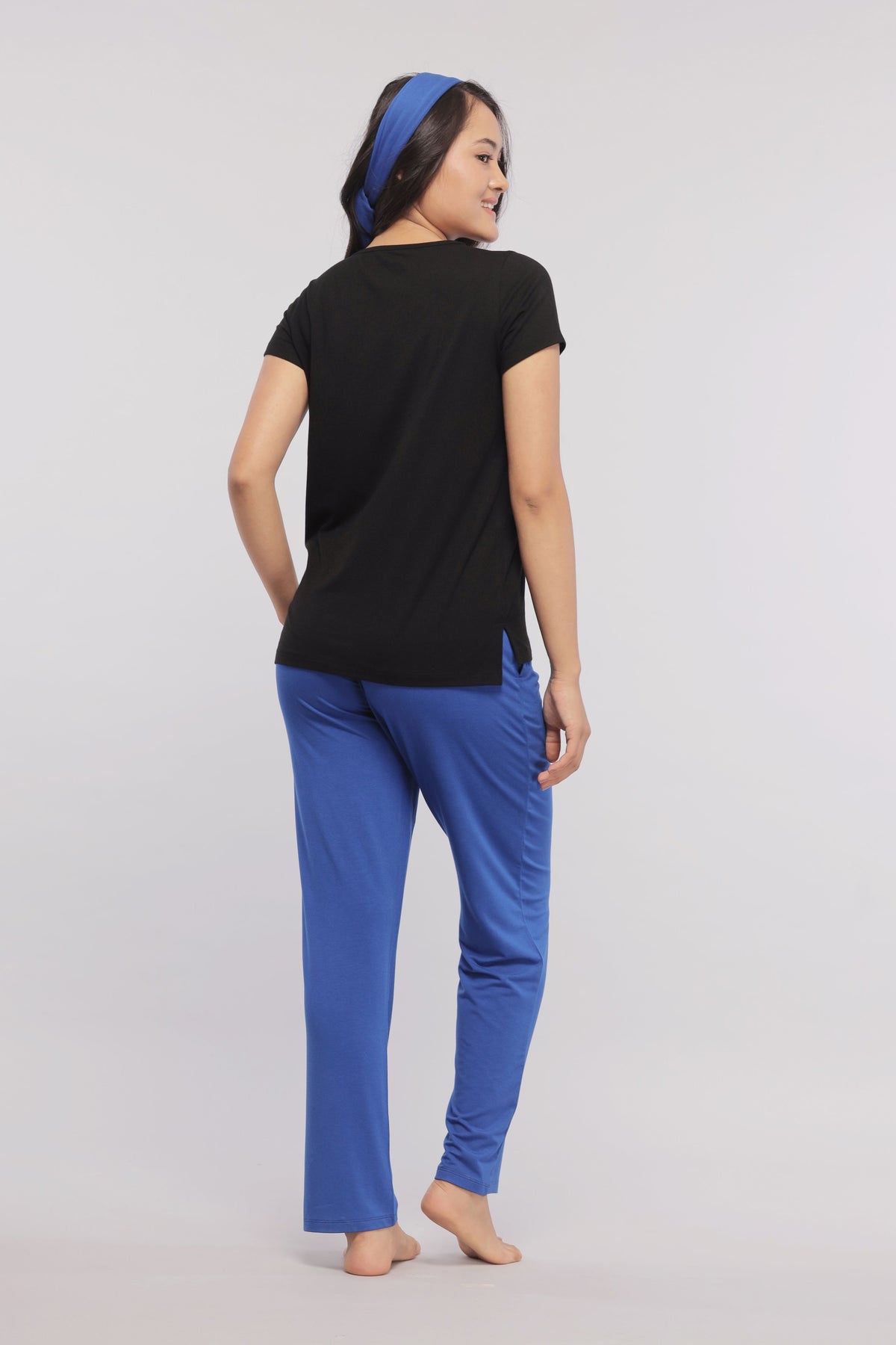 Model wearing True Blue Straight Lounge Pant from the back.