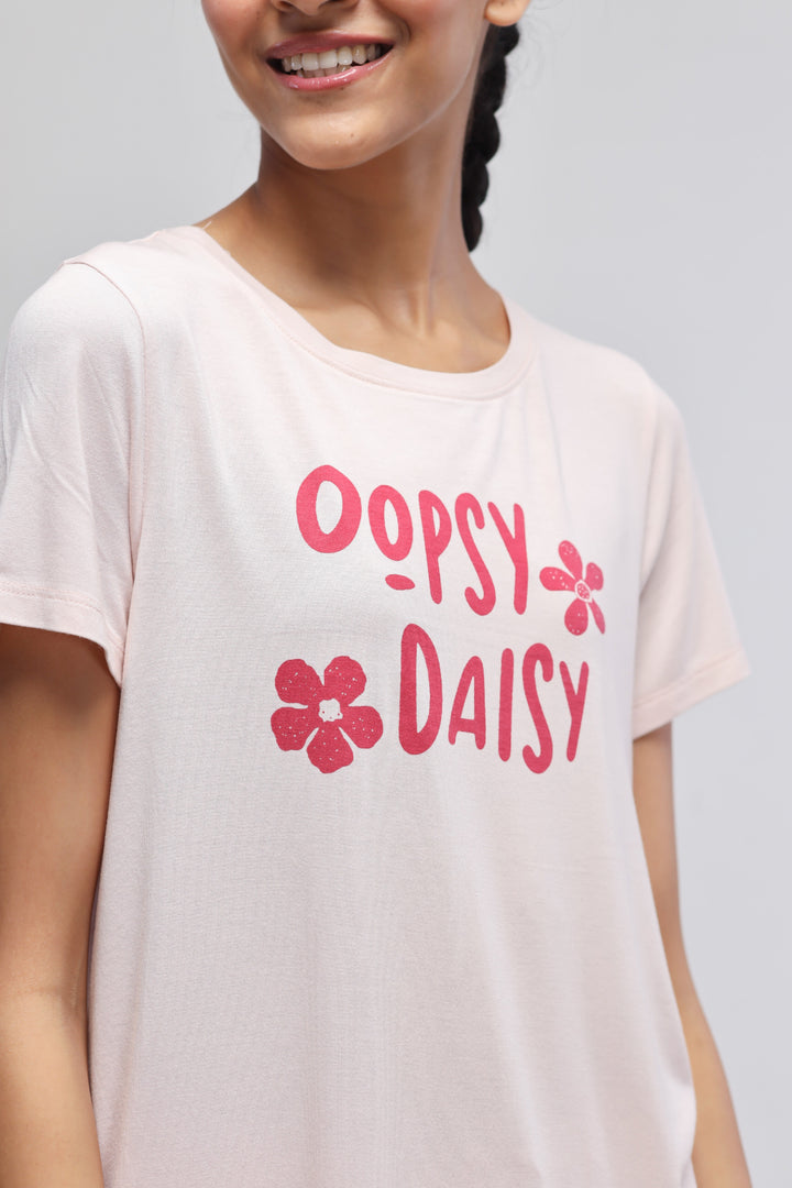 "Oopsy Daisy Flared Pajama Set featuring playful floral design."