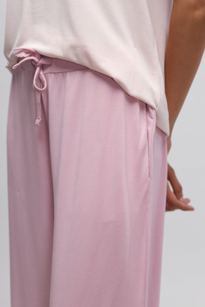 Deep pink flared pajama with stylish side slits, comfortable and chic.