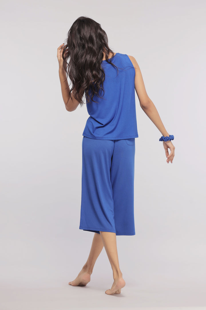 Model showcasing True Blue Culottes in vibrant blue.