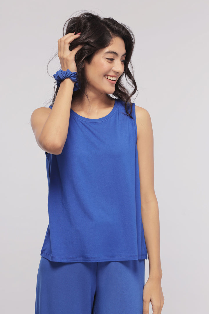 Model wearing True Blue Culottes and matching blue top.