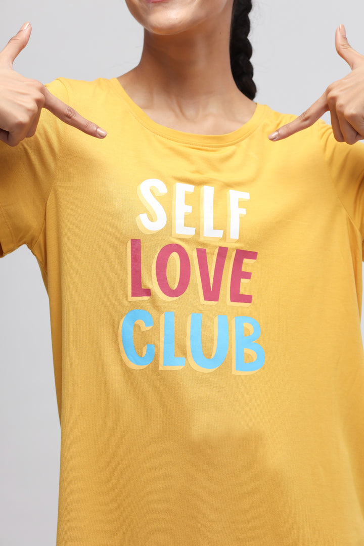 Self Love Top in vibrant yellow with colorful text design.