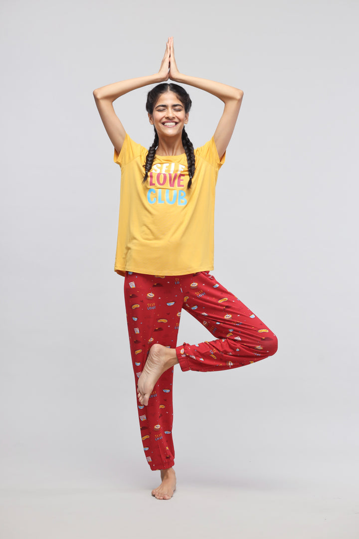 Self Love Cuff Pajama Set with bright colors and playful patterns.