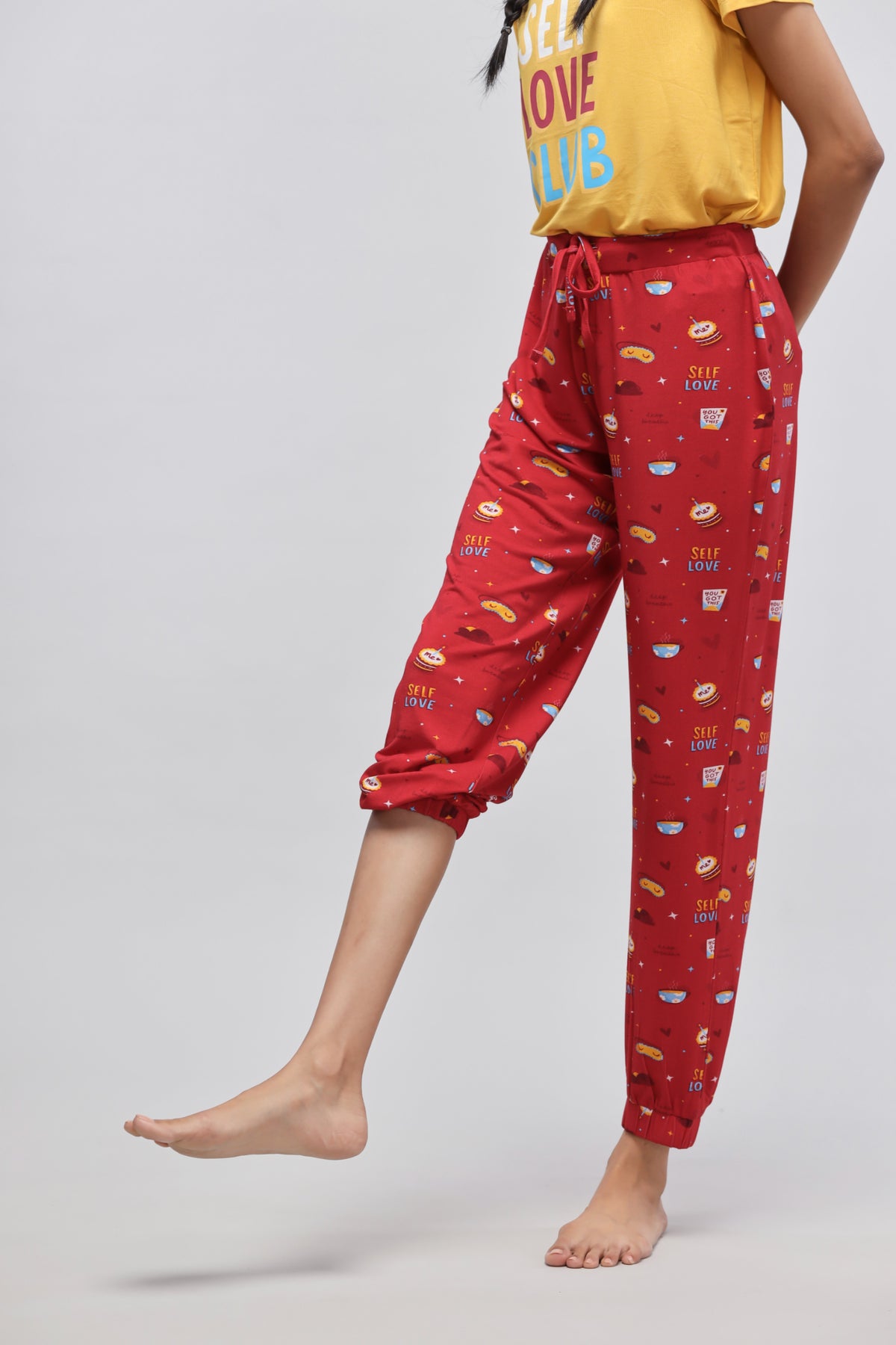 Self Love Cuffed Pajamas featuring playful prints and comfortable fit.