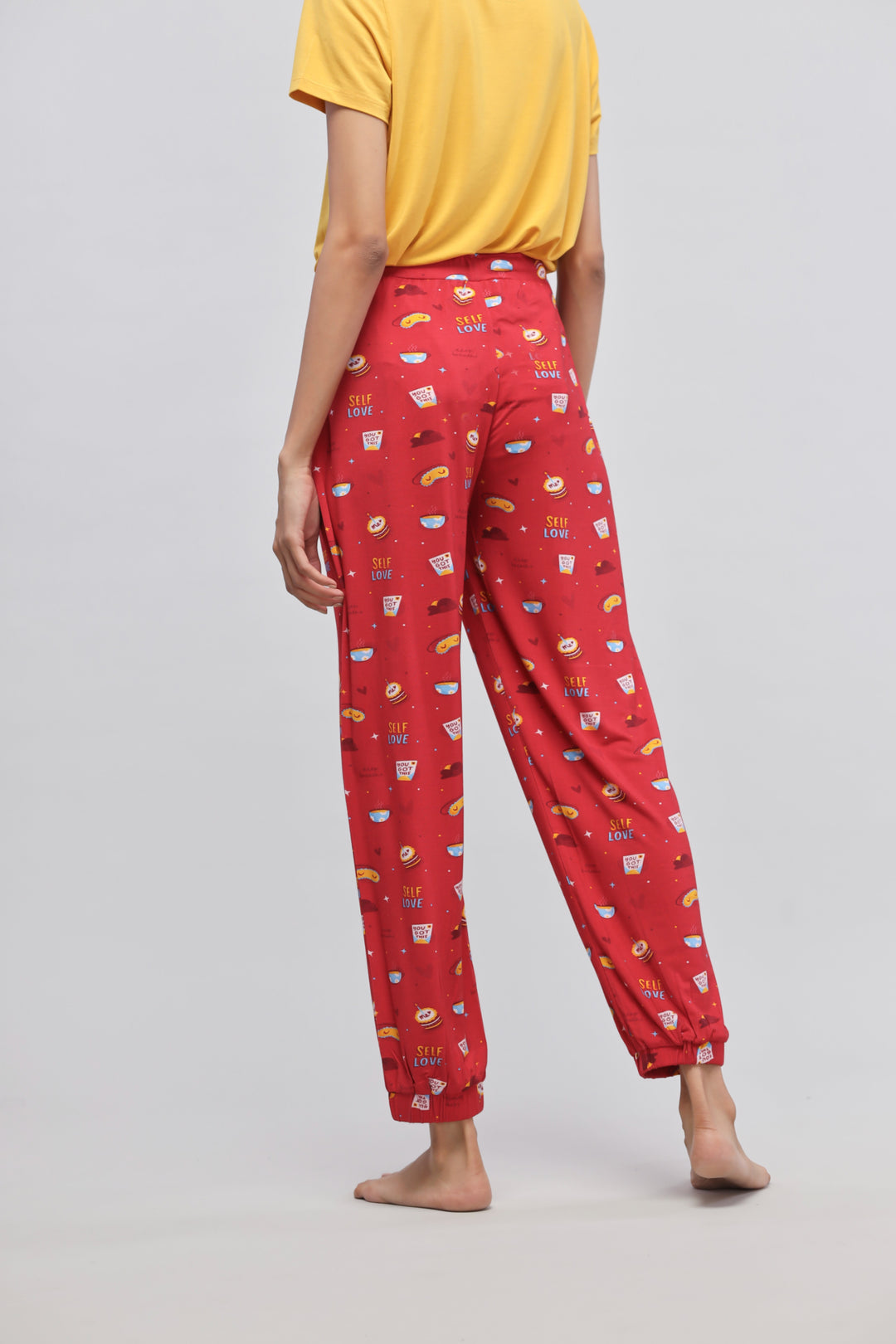 Stylish Self Love Cuff Pajama Set with vibrant red design.