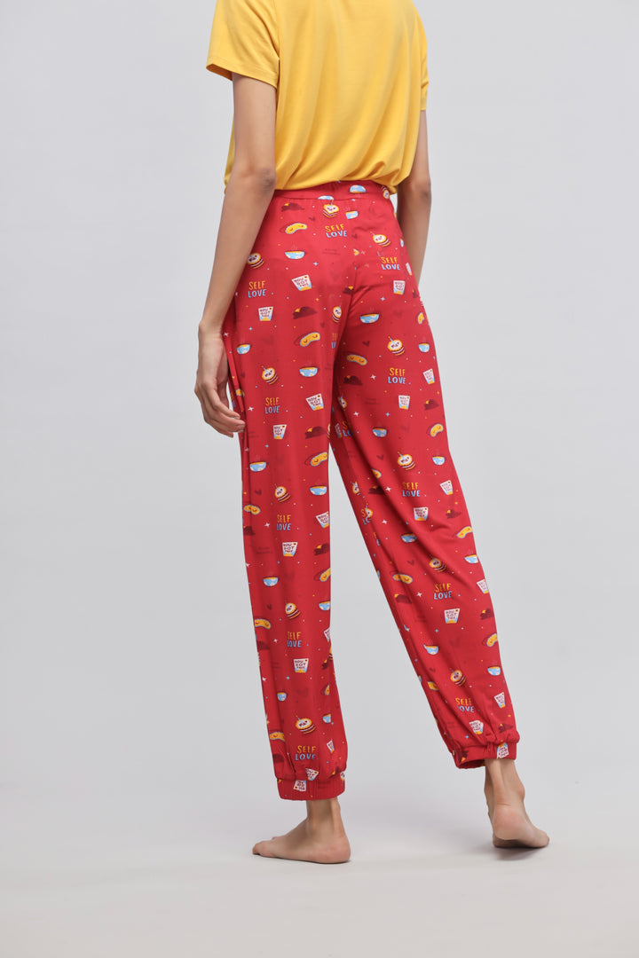 Stylish Self Love Cuff Pajama Set with vibrant red design.