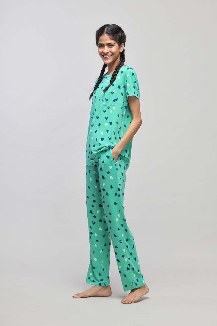 Heartsy Pajama Set featuring a model in heart-patterned sleepwear.