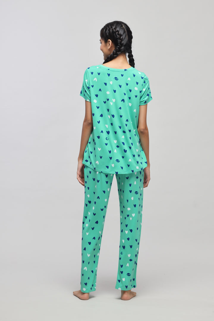 Heartsy Pajama Set featuring heart print design in green color.