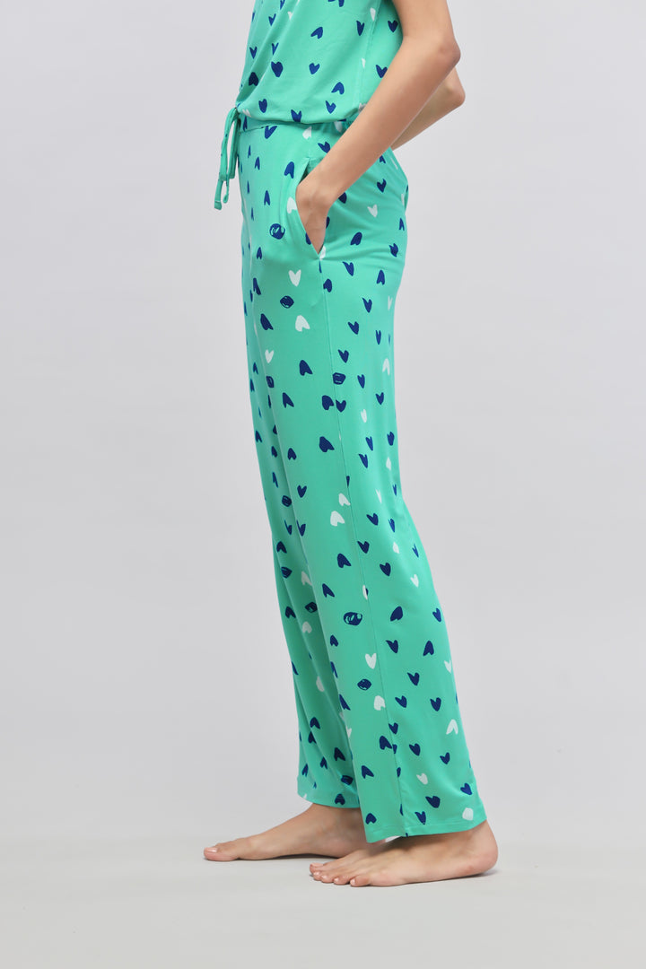 Heartsy Pajama Set in teal with colorful heart patterns.