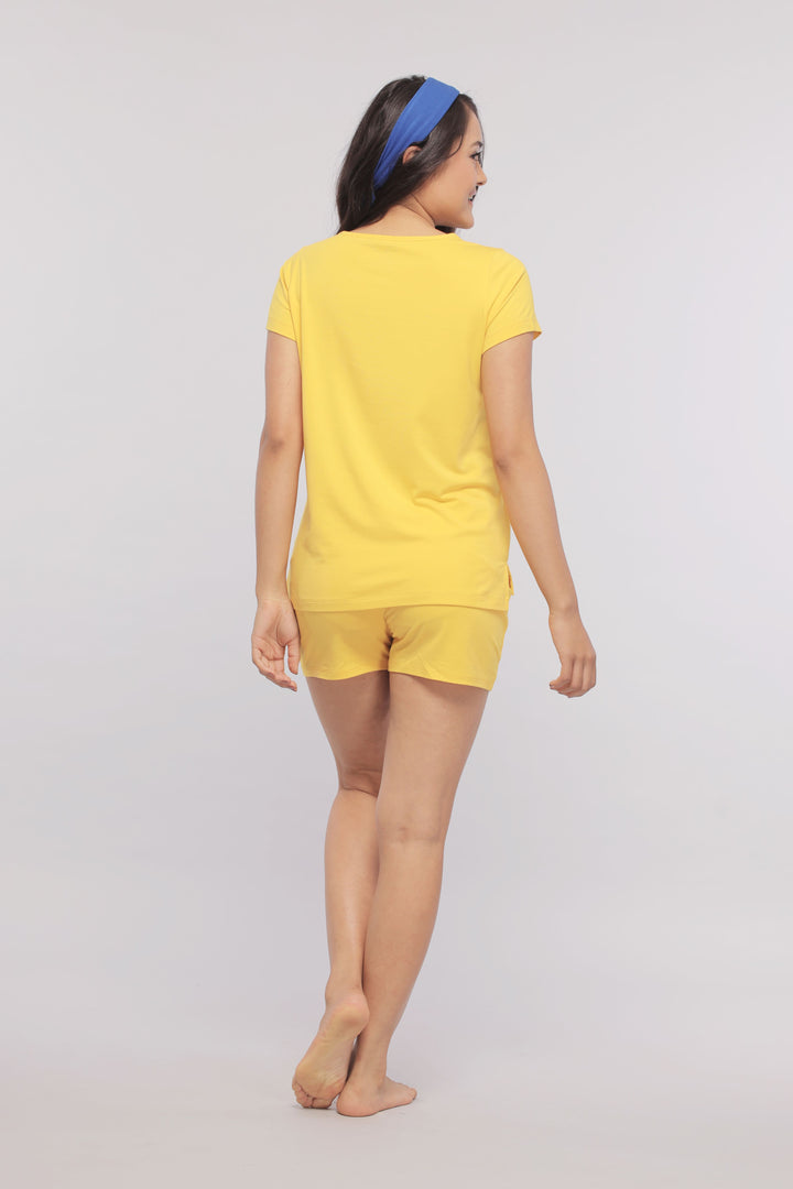 Sunny Lime Supima® Shorts Set in vibrant yellow on model.