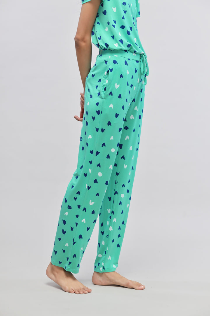 Heartsy Pajama Set featuring a teal pattern with hearts for stylish comfort.