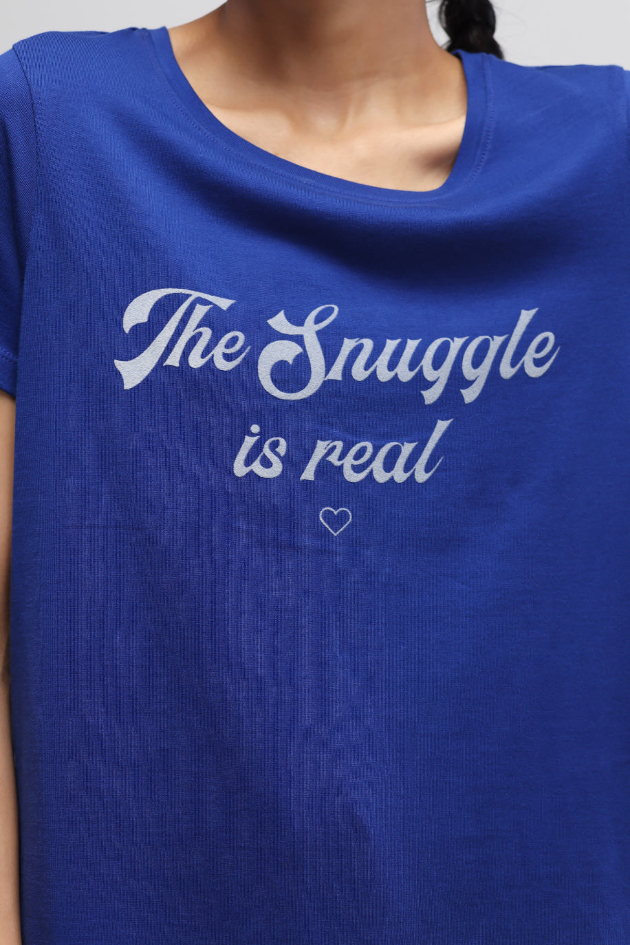 Blue top featuring "The Snuggle is Real" design for cozy style.