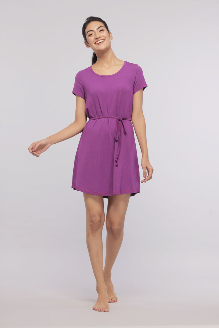 Breezy purple sleep dress on a smiling model with tie waist.