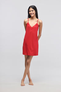 Cherry red lace short dress on a smiling model.